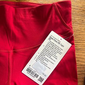 Lululemon base pace high-rise tight 28" size 6 dark red